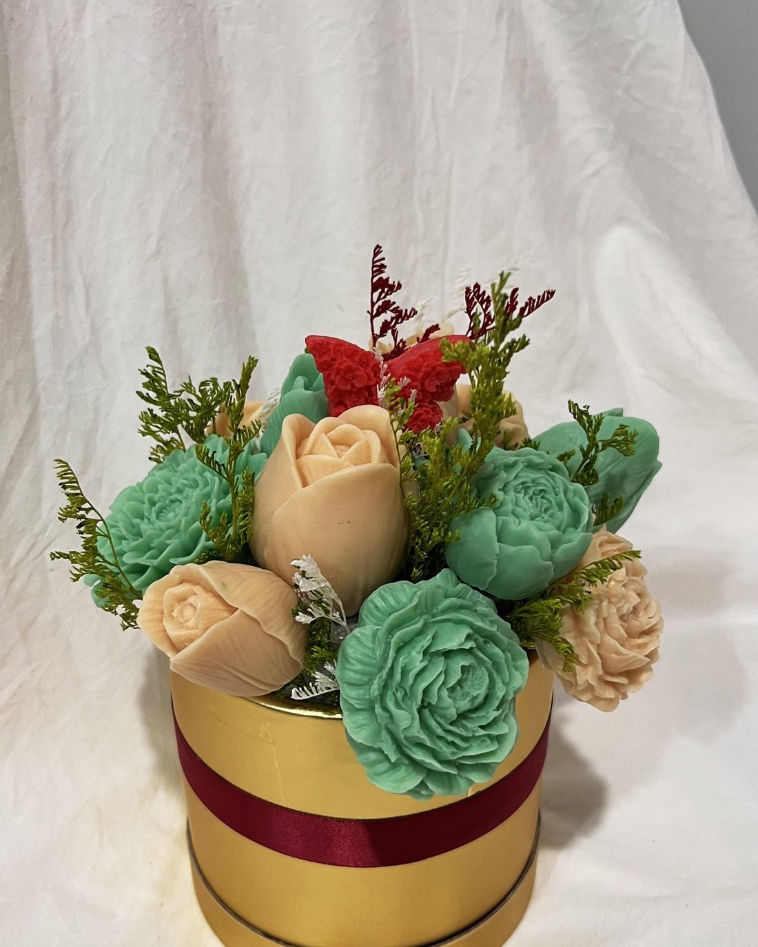 Bloom & Beyond soap flower arrangement in red, cream and green