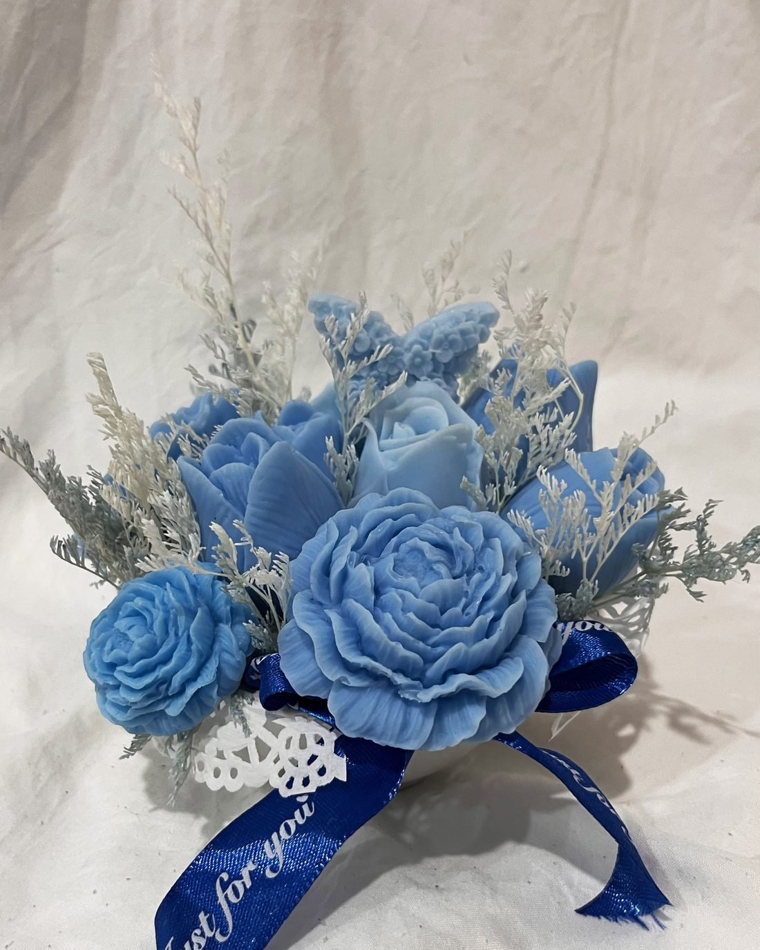 Petal Paradise soap flower arrangement in blue